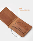 An open brown leather wallet on a light gray background, with text reading 'YOUR PERSONALIZATION' and a circle highlighting a printed message inside that says 'I love you to the moon and back'.
