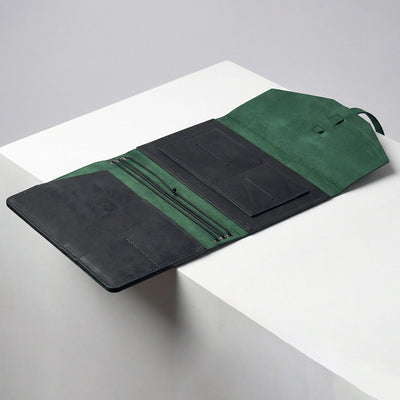 black and green notebook cover