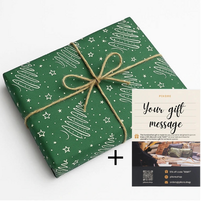 Green gift wrap with white patterns and a brown ribbon, accompanied by a gift message card on a white background.