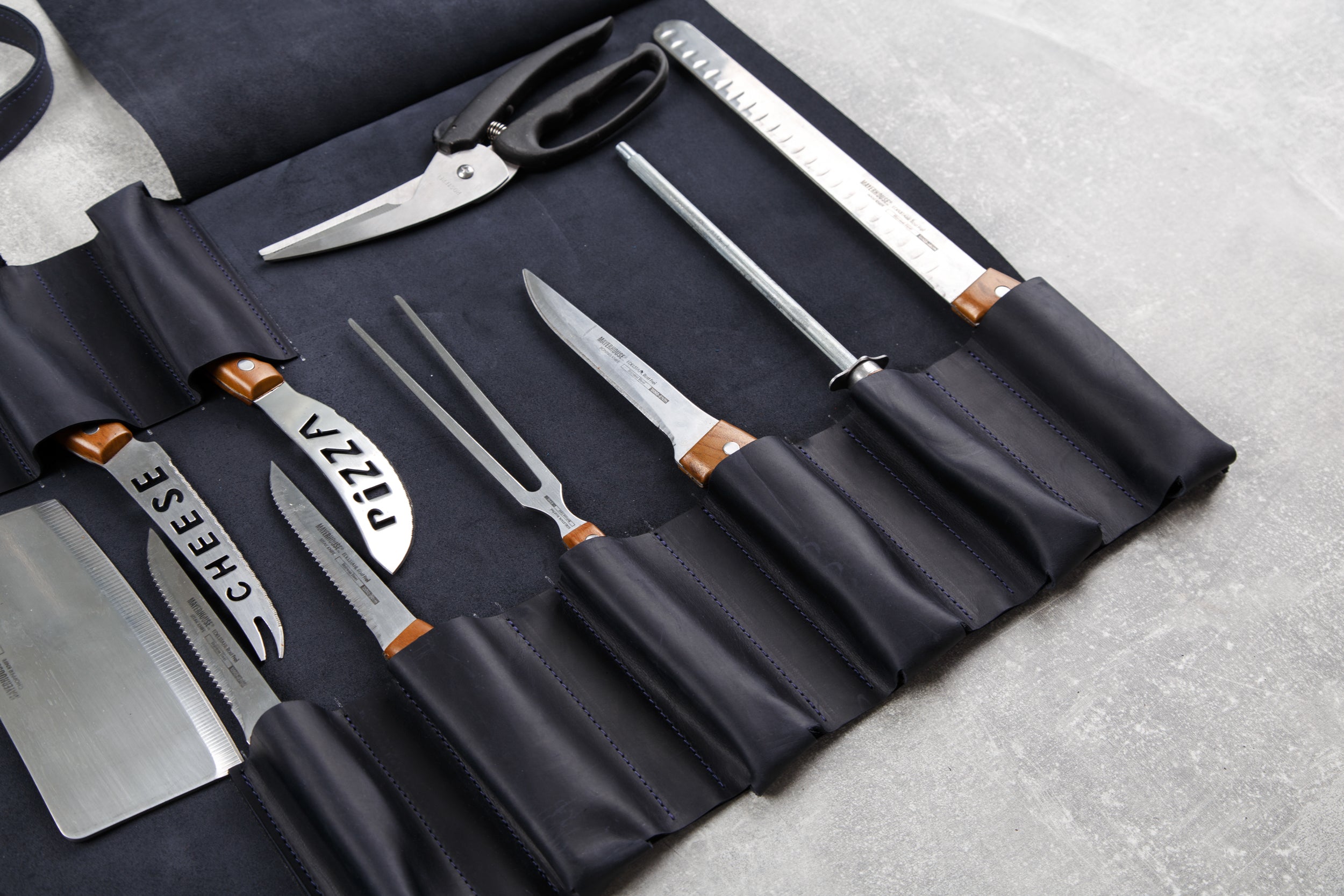 Fancy kitchen knife set with leather roll bag