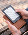 Handmade leather Kobo eReader case with secure closure and slim protective design.