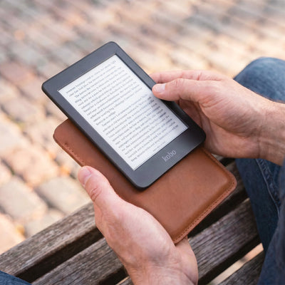 Handmade leather Kobo eReader case with secure closure and slim protective design.