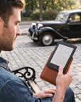 Genuine leather Kobo cover featuring handcrafted details and secure magnetic closure.