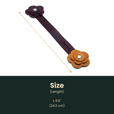 A dark brown fabric headband with brown and purple fabric flower embellishments, shown with a size indicator arrow and text stating 'Size (Length) L 9.5" (24.