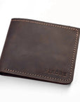 A dark brown leather bi-fold wallet with visible stitching and the brand name 'PIKORE' embossed in the bottom right corner, shown on a plain white background.
