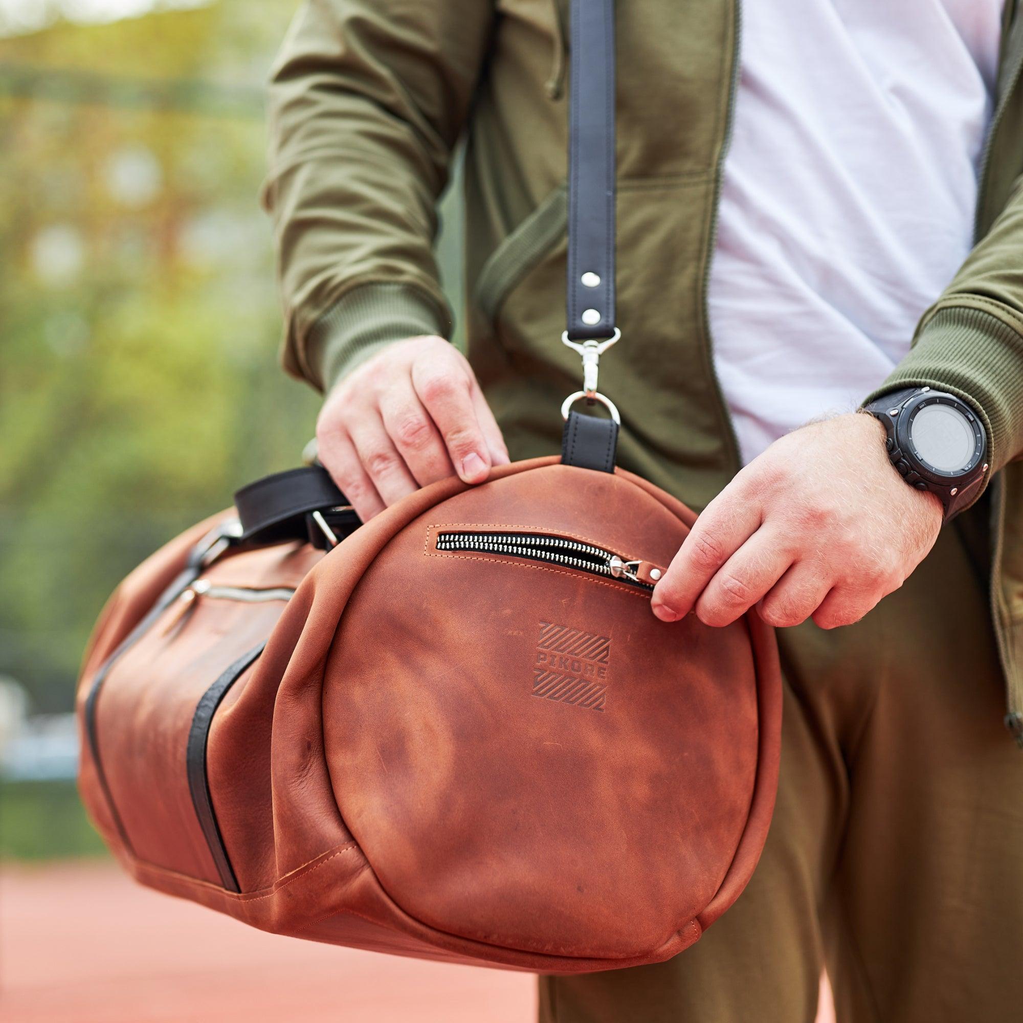 Leather duffle bag on sale backpack