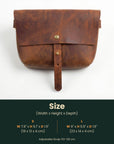 Brown leather bag with size chart on a white background