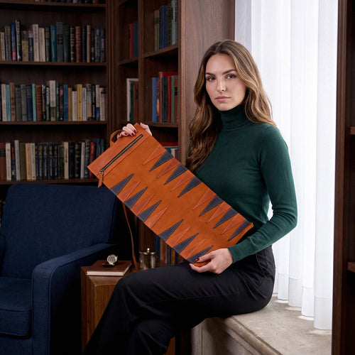 Woman holding a brown leather suitcase in a room with bookshelves and a blue chair.