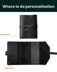 Black leather-bound book with customization points indicated on a white background
